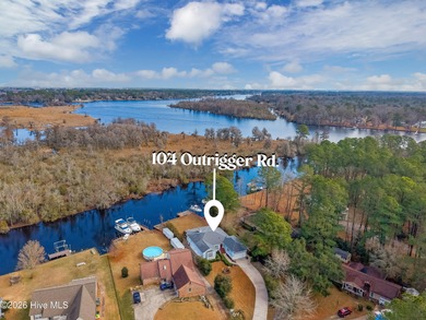Waterfront living at its finest! This beautiful home offers on River Bend Golf and Country Club in North Carolina - for sale on GolfHomes.com, golf home, golf lot