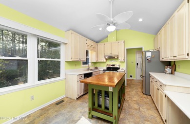 Waterfront living at its finest! This beautiful home offers on River Bend Golf and Country Club in North Carolina - for sale on GolfHomes.com, golf home, golf lot