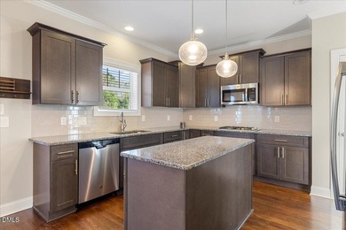 Welcome to 128 Heathgreen Drive, a beautifully maintained home on The Neuse Golf Club in North Carolina - for sale on GolfHomes.com, golf home, golf lot