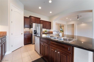 Experience resort-style living in this top-floor penthouse with on Reflection Bay Golf Club in Nevada - for sale on GolfHomes.com, golf home, golf lot