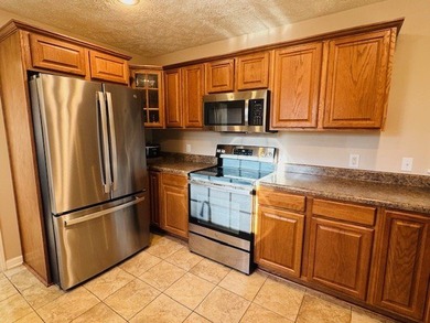 Spacious 4-bedroom, 3 full-bath home located on the 8th hole of on Skyland Lakes Golf Course in Virginia - for sale on GolfHomes.com, golf home, golf lot