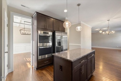 Welcome to 128 Heathgreen Drive, a beautifully maintained home on The Neuse Golf Club in North Carolina - for sale on GolfHomes.com, golf home, golf lot