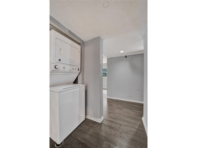 GREAT OPPORTUNITY TO OWN A RARELY AVAILABLE, LARGE CORNER UNIT on Flamingo Lakes Country Club in Florida - for sale on GolfHomes.com, golf home, golf lot