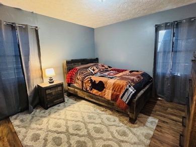 Spacious 4-bedroom, 3 full-bath home located on the 8th hole of on Skyland Lakes Golf Course in Virginia - for sale on GolfHomes.com, golf home, golf lot