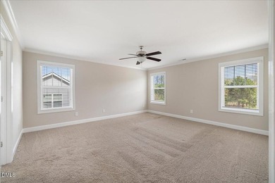 Welcome to 128 Heathgreen Drive, a beautifully maintained home on The Neuse Golf Club in North Carolina - for sale on GolfHomes.com, golf home, golf lot