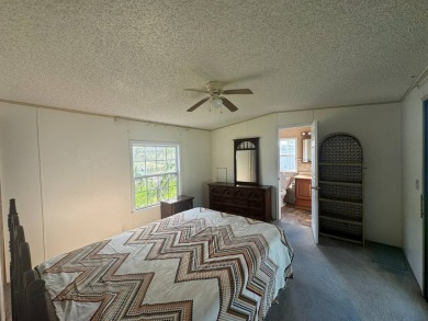 This home has great bones as they say! It's a large home with an on Golden Lakes Golf Course in Florida - for sale on GolfHomes.com, golf home, golf lot