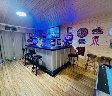 Spacious 4-bedroom, 3 full-bath home located on the 8th hole of on Skyland Lakes Golf Course in Virginia - for sale on GolfHomes.com, golf home, golf lot