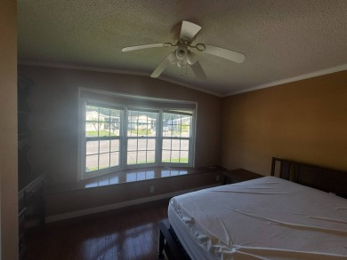 This home has great bones as they say! It's a large home with an on Golden Lakes Golf Course in Florida - for sale on GolfHomes.com, golf home, golf lot