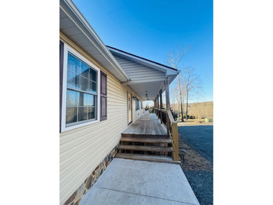 Spacious 4-bedroom, 3 full-bath home located on the 8th hole of on Skyland Lakes Golf Course in Virginia - for sale on GolfHomes.com, golf home, golf lot