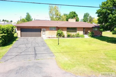 PRICE IMPROVED!! Beautiful brick home perfectly located in Rigby on Jefferson Hills Golf Course in Idaho - for sale on GolfHomes.com, golf home, golf lot