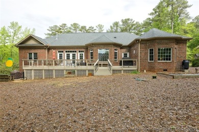 Stunning custom built home located in the Gated and Golf on Carolina Trace Country Club in North Carolina - for sale on GolfHomes.com, golf home, golf lot