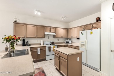 The spacious, open-concept layout seamlessly integrates the on Springfield Golf Resort in Arizona - for sale on GolfHomes.com, golf home, golf lot