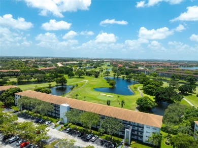 Welcome to your personal paradise in Century Village, a gated on Flamingo Lakes Country Club in Florida - for sale on GolfHomes.com, golf home, golf lot
