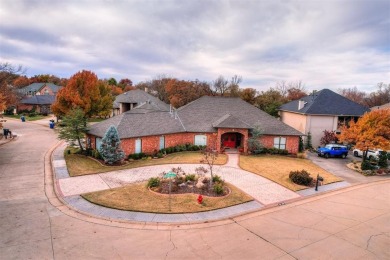 Lovely one level garden home with a view of the 12th fairway at on Oak Tree National Golf and Country Club in Oklahoma - for sale on GolfHomes.com, golf home, golf lot