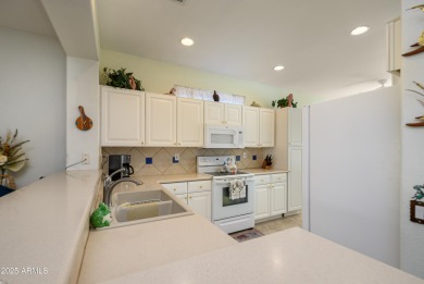 Walking distance to Adobe Rec Center. NEWER ROOF & SOLAR HAS A on Sun City Grand Golf Couse and Club in Arizona - for sale on GolfHomes.com, golf home, golf lot