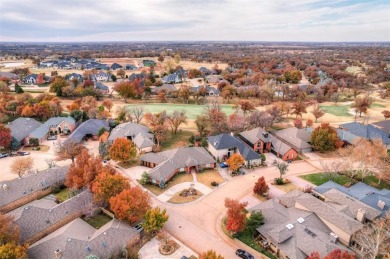 Lovely one level garden home with a view of the 12th fairway at on Oak Tree National Golf and Country Club in Oklahoma - for sale on GolfHomes.com, golf home, golf lot