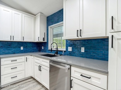 Fall in love with this picturesque 4 bedrooms, 2 bath, 2 car on Citrus Hills Golf Club in Florida - for sale on GolfHomes.com, golf home, golf lot