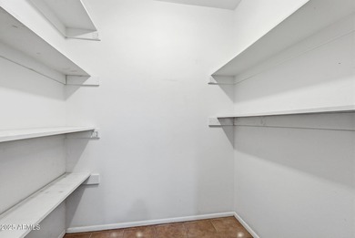 Move-in ready and freshly painted in November, this charming on PalmBrook Country Club in Arizona - for sale on GolfHomes.com, golf home, golf lot