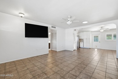 Move-in ready and freshly painted in November, this charming on PalmBrook Country Club in Arizona - for sale on GolfHomes.com, golf home, golf lot