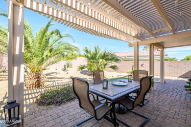 Walking distance to Adobe Rec Center. NEWER ROOF & SOLAR HAS A on Sun City Grand Golf Couse and Club in Arizona - for sale on GolfHomes.com, golf home, golf lot