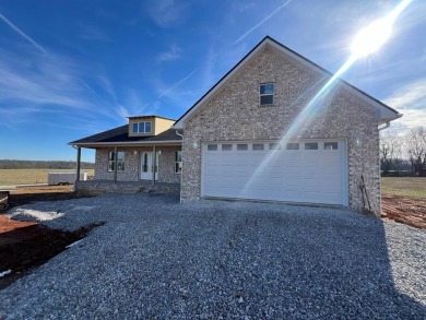 Nestled in the heart of Willow Estates, this stunning new brick on Southern Hills Golf and Country Club in Tennessee - for sale on GolfHomes.com, golf home, golf lot