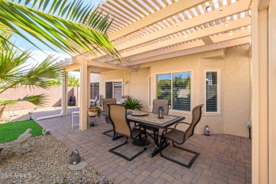 Walking distance to Adobe Rec Center. NEWER ROOF & SOLAR HAS A on Sun City Grand Golf Couse and Club in Arizona - for sale on GolfHomes.com, golf home, golf lot