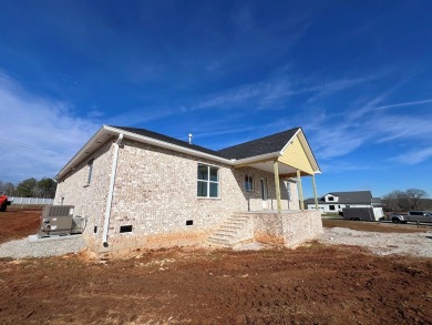 Nestled in the heart of Willow Estates, this stunning new brick on Southern Hills Golf and Country Club in Tennessee - for sale on GolfHomes.com, golf home, golf lot