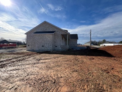 Nestled in the heart of Willow Estates, this stunning new brick on Southern Hills Golf and Country Club in Tennessee - for sale on GolfHomes.com, golf home, golf lot