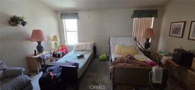 Welcome to this spacious 2-bedroom, 2-bath mobile home offering on The Club At Shenandoah Springs in California - for sale on GolfHomes.com, golf home, golf lot