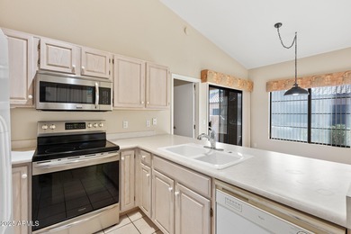 Nice Unit in Gated Sun Village Resort! Vaulted ceilings, tile on Sun Village Golf Course in Arizona - for sale on GolfHomes.com, golf home, golf lot