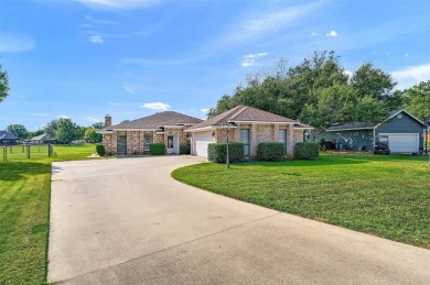 Discover this inviting 4-bedroom, 2-bathroom home situated in a on Lake Kiowa Golf Course in Texas - for sale on GolfHomes.com, golf home, golf lot