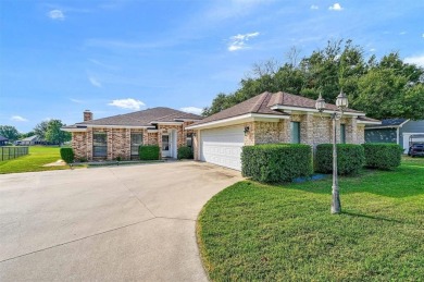 Discover this inviting 4-bedroom, 2-bathroom home situated in a on Lake Kiowa Golf Course in Texas - for sale on GolfHomes.com, golf home, golf lot