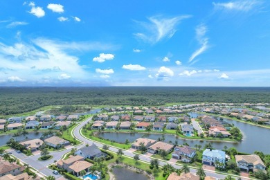 This stunning waterfront home, situated on a rare, ultra-premium on Jupiter Country Club in Florida - for sale on GolfHomes.com, golf home, golf lot