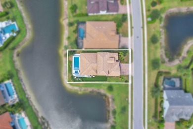 This stunning waterfront home, situated on a rare, ultra-premium on Jupiter Country Club in Florida - for sale on GolfHomes.com, golf home, golf lot