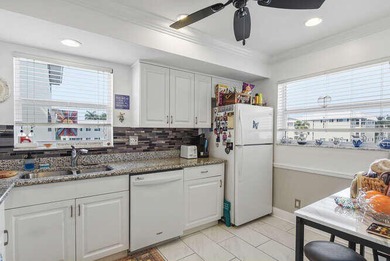 Live the coastal lifestyle!This beautifully updated on The Little Club in Florida - for sale on GolfHomes.com, golf home, golf lot