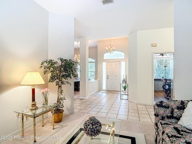 Fall in love with this picturesque Golf Course View heated pool on Citrus Hills Golf Club in Florida - for sale on GolfHomes.com, golf home, golf lot