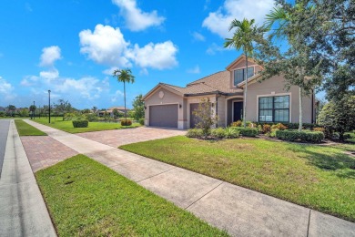 This stunning waterfront home, situated on a rare, ultra-premium on Jupiter Country Club in Florida - for sale on GolfHomes.com, golf home, golf lot