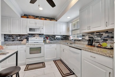 Live the coastal lifestyle! This beautifully updated on The Little Club in Florida - for sale on GolfHomes.com, golf home, golf lot