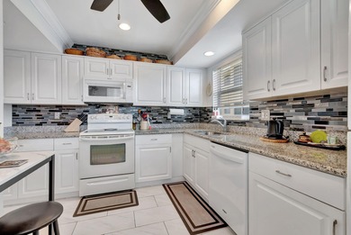 Live the coastal lifestyle!This beautifully updated on The Little Club in Florida - for sale on GolfHomes.com, golf home, golf lot