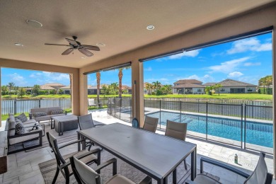 This stunning waterfront home, situated on a rare, ultra-premium on Jupiter Country Club in Florida - for sale on GolfHomes.com, golf home, golf lot