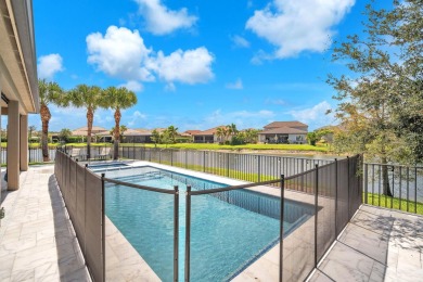 This stunning waterfront home, situated on a rare, ultra-premium on Jupiter Country Club in Florida - for sale on GolfHomes.com, golf home, golf lot