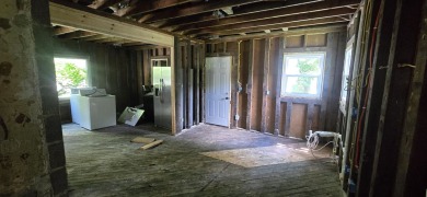 Investor special directly across from Ingersoll Golf Course! on Ingersoll Golf Course and Learning Links in Illinois - for sale on GolfHomes.com, golf home, golf lot