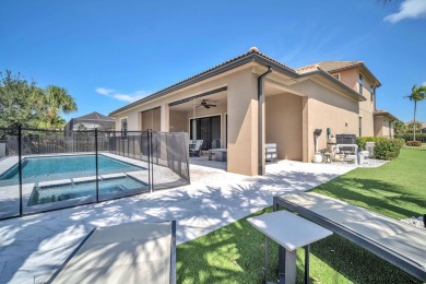 This stunning waterfront home, situated on a rare, ultra-premium on Jupiter Country Club in Florida - for sale on GolfHomes.com, golf home, golf lot