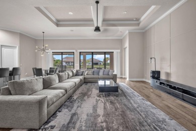 This stunning waterfront home, situated on a rare, ultra-premium on Jupiter Country Club in Florida - for sale on GolfHomes.com, golf home, golf lot
