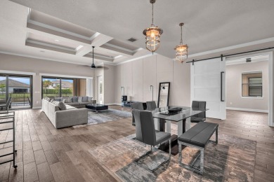 This stunning waterfront home, situated on a rare, ultra-premium on Jupiter Country Club in Florida - for sale on GolfHomes.com, golf home, golf lot