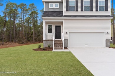 The Givens offers a beautifully crafted two-story design that on Harbour Point Golf Club in North Carolina - for sale on GolfHomes.com, golf home, golf lot