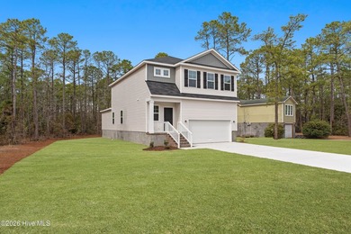 The Givens offers a beautifully crafted two-story design that on Harbour Point Golf Club in North Carolina - for sale on GolfHomes.com, golf home, golf lot