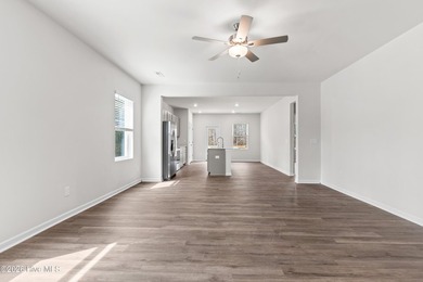 The Givens offers a beautifully crafted two-story design that on Harbour Point Golf Club in North Carolina - for sale on GolfHomes.com, golf home, golf lot