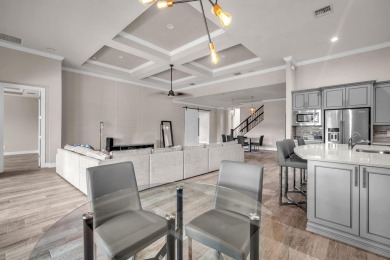 This stunning waterfront home, situated on a rare, ultra-premium on Jupiter Country Club in Florida - for sale on GolfHomes.com, golf home, golf lot