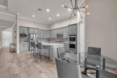 This stunning waterfront home, situated on a rare, ultra-premium on Jupiter Country Club in Florida - for sale on GolfHomes.com, golf home, golf lot